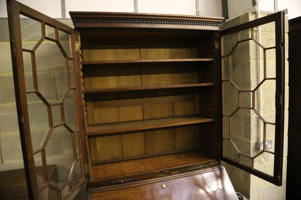 A George III mahogany bureau bookcase, width 107cm, depth 60cm, height 214cm